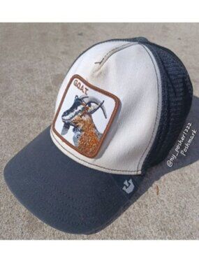 𝗚𝗢𝗢𝗥𝗜𝗡 𝗕𝗥𝗢𝗦 𝗧𝗛𝗘 𝗙𝗔𝗥𝗠 THE G.O.A.T Trucker Cap Black/White